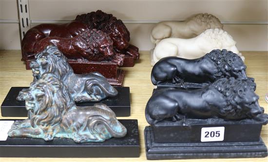 A group of lion bookends